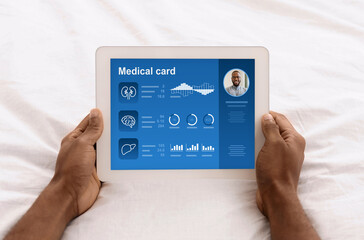 Aufkleber - Male hands holding digital tablet with medical card on screen