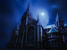 Spooky Old Church. Majestic Castle In The Gothic Style At Night. Medieval Temple By The Light Of The Moon. 