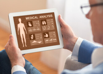 Aufkleber - Unrecognizable man using medical app on digital tablet