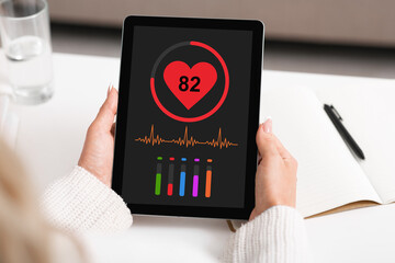 Poster - Woman having break while working, using health app