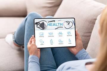 Aufkleber - Blonde lady enjoying newest health application on tablet