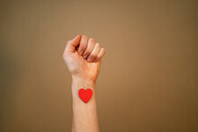 Man Haveing Red Heart On His Arm