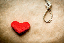 Concept Hangman Knot With Plush Red Heart