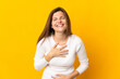 © luismolinero - Young Slovak woman isolated on yellow background smiling a lot
