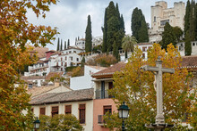 View Of The Realejo Neighborhood Of Granada From Campo Del Príncipe, With Its Typical White Houses With Cypress Trees In Autumn
