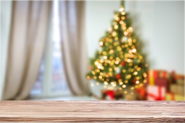 Wall Mural - Table space in front of defocused Christmas tree