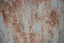 Rusty Texture Of A Light Grey Painted Metal Garage Door