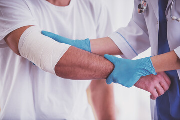 Wall Mural - Injury man in doctor