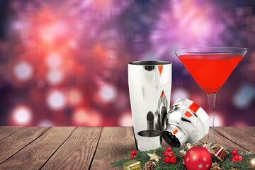 Poster - Winter alcoholic cocktail with berries, liquor for Christmas or New Year celebration. Holiday table setting