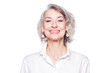 Close up portrait of overjoyed grey-haired middle aged female look at camera with a wide smile laughing and showing happiness, isolated on white studio background
