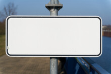 Blank White Sign With Text Space On A Pillar
