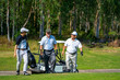© CandyRetriever  - Group of Asian people businessman and senior CEO enjoy outdoor sport golfing together at country club. Healthy men golfer holding golf bag walking on fairway with talking together on summer vacation