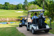 © CandyRetriever  - Group of Asian people businessman and senior CEO enjoy outdoor activity lifestyle sport golfing together at golf country club. Healthy men golfer driving golf cart on golf course in summer sunny day