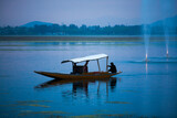 Fototapeta Natura - Dal Lake is The second largest in the state, Local people and traveler are use small wooden boat call 'Shikara' is a vehicle in the lake