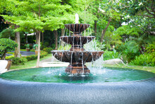 Fountain In The Garden.