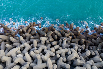 Sticker - Top down view of the wave breaker over the sea