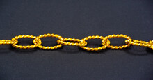 Gold Chain To Be Worn Around The Neck. A Chain Is A Sequential Assembly Of Connected Parts, Made Of Gold, With An Overall Character Similar To That Of Rope In That It Is Flexible And Curved