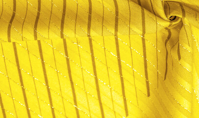 yellow amber fabric with lurex stripes, perfect for a fresh and comfortable style. Design background