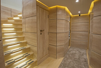 Interior corridor area of luxury motor yacht with staircase