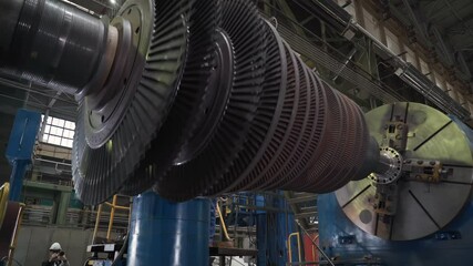 turbine manufacturing facility. the part of the turbine is spinning while it is attached to the test