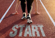 © Choi_ Nikolai - Running track with 'start' written on the floor and a woman is preparing to run on it