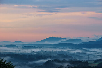 Wall Mural - Twilight before sunrise in the morning over mountain landscape near Bled, Slovenia