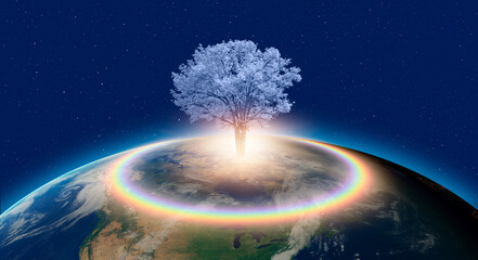 Wall Mural - planet earth with blue lone tree and rainbow spectacular sunset in the background 