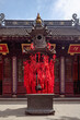 Incense burner with red praying ribbons at Hanshan Temple, in Suzhou, China