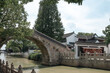 Traditional Chinese bridge and houses at Hanshan Temple, in Suzhou, China