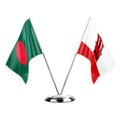 Two table flags isolated on white background 3d illustration, bangladesh and gibraltar