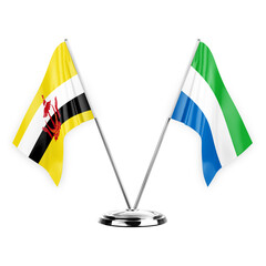 Two table flags isolated on white background 3d illustration, brunei and sierra leone