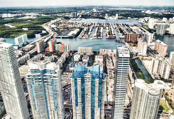 Wall Mural - Aerial view of Miami Beach with shoreline and skyscrapers