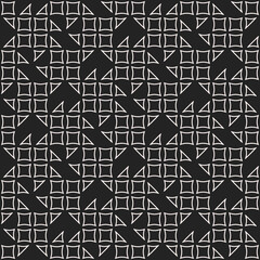Poster - White shapes in the form of a mosaic on a black background. Vector with simple shapes, sometimes repeating elements.