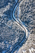 © biletskiyevgeniy.com - Natural winter landscape from air. Aerial view on the road and forest at the winter time. Winter chill. Forest and snow. The photo is in high resolution.