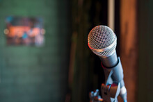Close Up Of Microphone In Concert Hall . Copy Space . Selective Focus
