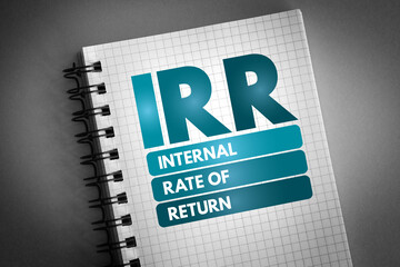 IRR - Internal Rate of Return acronym on notepad, business concept background