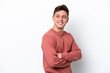 © luismolinero - Young handsome Brazilian man isolated on white background with arms crossed and happy
