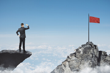 Poster - Abstract image of businessman looking into the distance while standing on edge of cliff, mock up place on sky with clouds background, red flag. Success, challenge, future and growth concept.