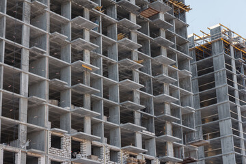 Poster - Construction of an apartment building. Construction of a multistorey concrete building. Concrete multi-storey building.