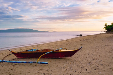 Wall Mural - Put yourself in this picture. Early morning walk. Sun, warm, alone on the beach, Banka boat to explore and paddle. Maybe fishing with Joe, a traditional fisherman. Tropical paradise. Philippines