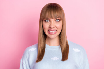 Poster - Portrait of attractive crazy evil girl hate expression grinning teeth isolated over pink pastel color background