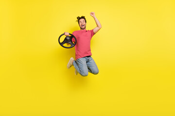 Sticker - Full length photo of cool beard millennial guy drive hooray jump wear red t-shirt jeans shoes isolated on yellow background