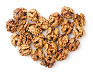 Wall Mural - Walnuts kernels lined with hearts on a white background. Top view