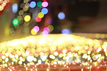 Wall Mural - Blur bokeh light bokeh abstract light background Blurred background. with color and bright on a New year Event.