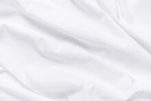 Abstract White Fabric Texture Background. Cloth Soft Wave. Creases Of Satin, Silk, And Cotton.