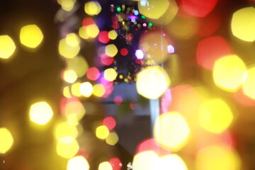 Wall Mural - Blur bokeh light bokeh abstract light background Blurred background. with color and bright on a New year Event.