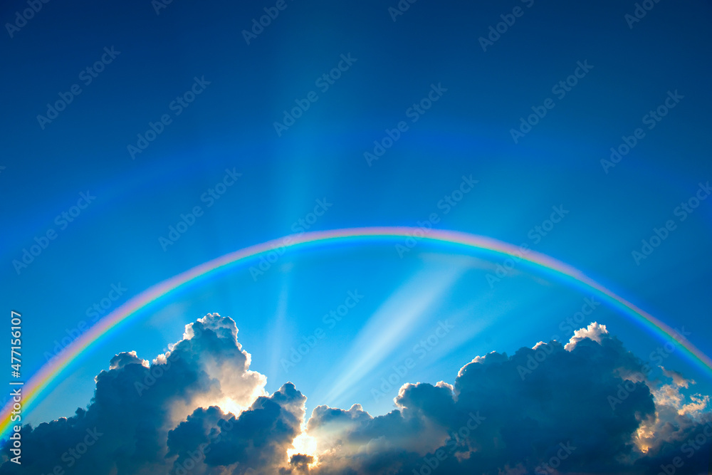 Double rainbow and clouds on sky at sunset Stock Photo | Adobe Stock