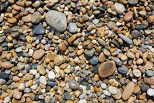 Overhead View Of Wet Stones On Beach