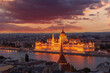 © Tetra Images - Hungary, Budapest, Cityscape with Hungarian Parliament at sunset