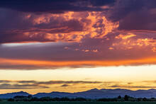 USA, Idaho, Bellevue, Cloudy Sunset Sky Over Mountains